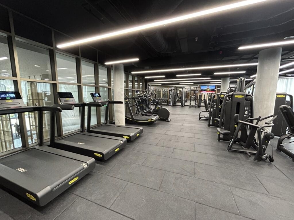 Gym with treadmills, exercise bikes and weight-training machines