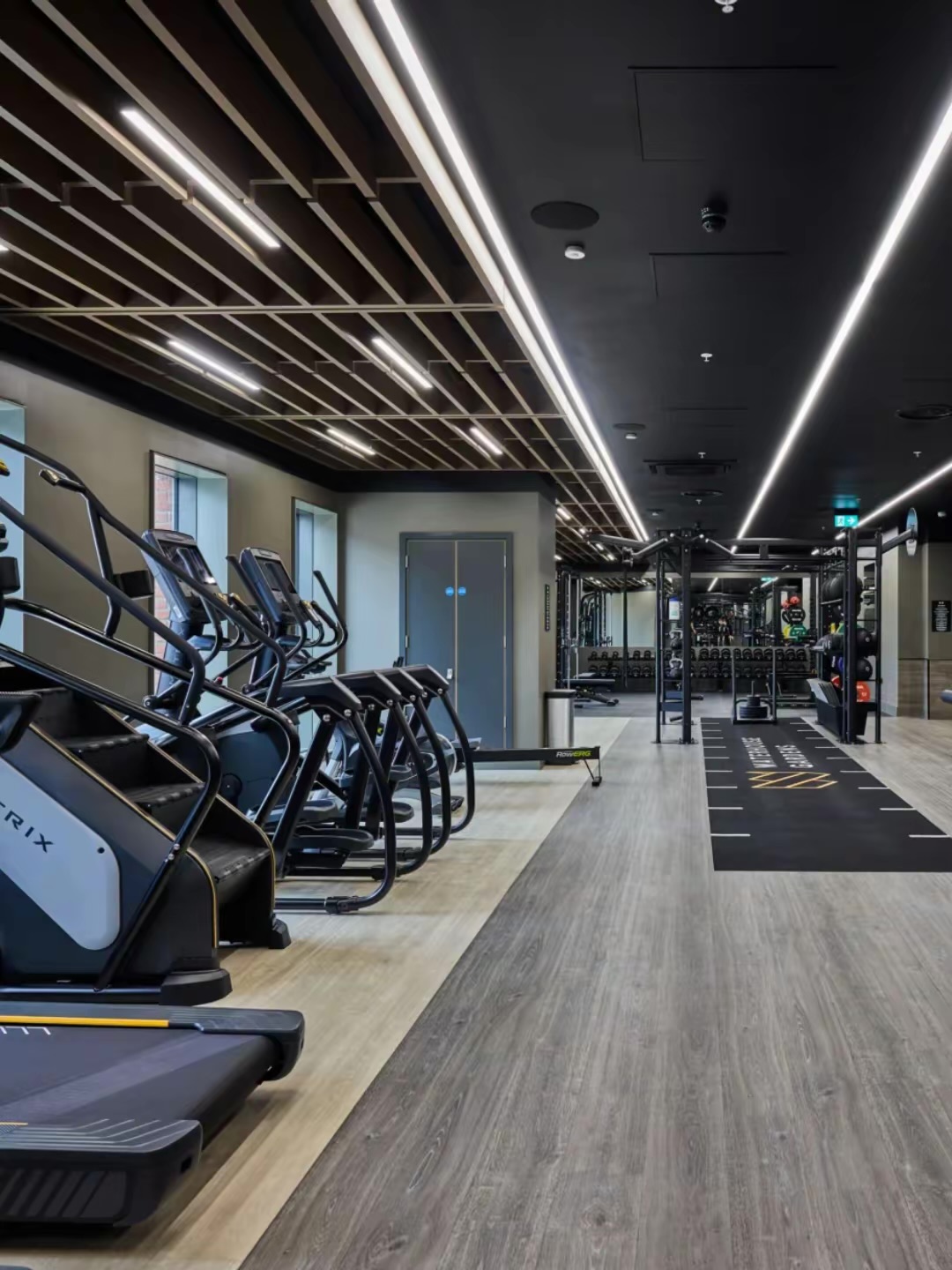 Gym with cardio machines, weights and strength-training equipment