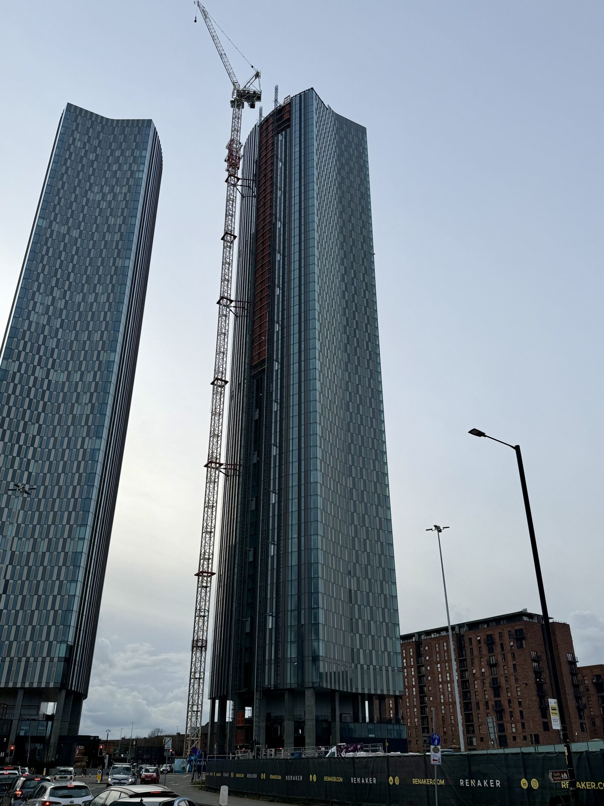 Trinity Heights, the right-hand tower under construction — February 2026; Vista River Gardens at left